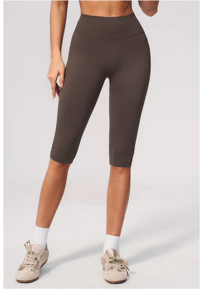Women's Seamless Ribbed High Waist Yoga Capri Pants Tummy Control Butt Lifting Leggings Squat Proof 4-Way Running Workout Tights